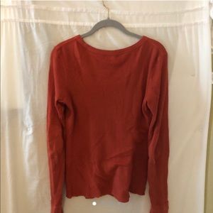 Rust red long sleeve knit shirt with elbow patches